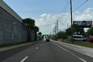 The return ramp to U.S. 19 northbound follows 110th Avenue N ahead of CR 296 (118th Avenue N).