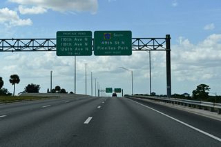 A loop ramp follows from U.S. 19 north to County Road 611 (49th Street N) south. 49th Street N narrows into an older commercial arterial through Pinellas Park and the Kenneth City vicinity.