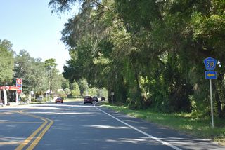 A sparsely signed route, County Road 21B follows a convoluted loop west from SR 21 to Little Santa Fe Lake and north to SR 100 beyond Silver Lake.