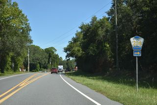 CR 214 connects with SR 100 south of the unincorporated community of Lake Geneva in Clay County.
