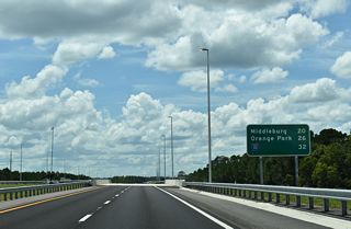 The toll road extends 32 miles north from U.S. 17 near Green Cove Springs to Interstate 10 west of Whitehouse in Jacksonville.