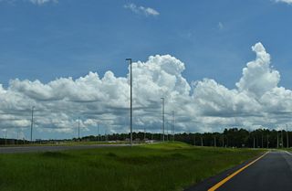 The ensuing stretch of the First Coast Expressway aims northeast past Reynolds Airpark (FL60) to SR 16 west of the Shands Bridge across the St. Johns River.