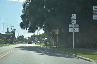 U.S. 98 separates from U.S. 19 north along Hampton Springs Avenue where U.S. 27/221 turn north. West from Perry, U.S. 98 traverses areas of wetlands north of the Gulf of Mexico to SR 267 at Newport and U.S. 319 near Medart.