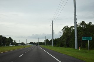 Signage previously indicated that U.S. 41 entered Land O&apos; Lakes just south of SR 52. The unincorporated community center is roughly based upon the intersection where U.S. 41 meets SR 54, seven miles to the south.