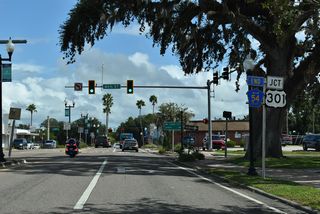 An end shield for CR 54 appears along 5th Avenue east ahead of 6th street, one block from U.S. 301 (Gall Boulevard).