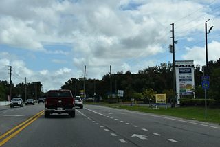 CR 54 reasurrance marker posted east of Coats Road by Zephyrhills Plaza shopping center.