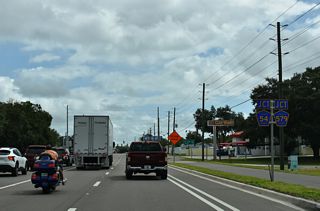 CR 579 (Morris Bridge Road) extends 3.52 miles north from the Hillsborough County line to meet CR 54 across from the leg of CR 54 along Eiland Boulevard.
