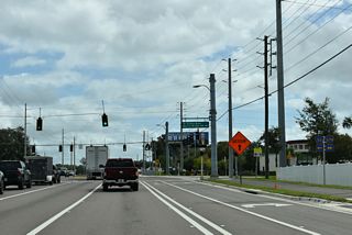 CR 54 and CR 579 overlap 1.85 miles north along Eiland Boulevard from CR 54 to Handcart Road. CR 54 (Eiland Boulevard) curves east from there 3.89 miles to U.S. 301 in Zephyrhills.