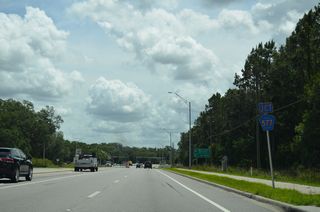 CR 577 (Curley Road) runs north through a mix of suburban development and ranch land to CR 52 in the city of San Antonio.