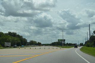 Zephyrhills Bypass branches east from CR 54 between CR 577 (Curley Road) and Chapel Crossings Boulevard. The westernmost portion of the suburban boulevard was built in anticipation of the cancelled Zephyrhills West Bypass Extension.