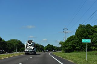 Shifting northwest at Old Hopewell Road, westbound SR 60 enters the unincorporated community of Bealsville.
