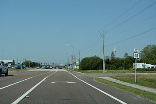 SR 60 (Adamo Drive) continues west through industrial east Tampa to meet U.S. 41 (N 50th Street / Tamiami Trail).