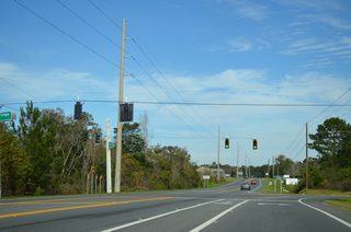 Unmarked along SR 71, Blue Springs Road is County Road 164 leading east 9.4 miles to SR 69 at Dellwood.
