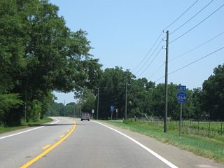 Continuing north to the settlement of Rock Creek, SR 71 approaches CR 264 (Suncrest Road).