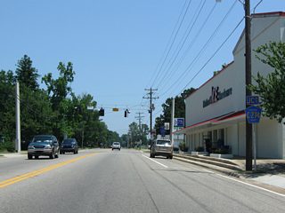 CR 274 dog legs north alongside SR 71 one block to NE Broad Street.
