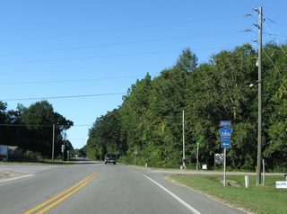 SR 71 advances north to Honeyville and then the east end of CR 386 near Lake Coma. CR 386 travels 19.46 miles southwest to Overstreet and U.S. 98 at Mexico Beach and Beacon Hill.