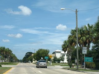 The first confirming marker for SR 71 north stands at Reid Avenue by Downtown Port St. Joe.