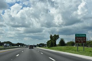 The Don Garlits Museum of Drag Racing lies along the southeast side of the exchange joining I-75 with CR 484. CR 484 east to U.S. 301 or U.S. 27/441 south leads to northern reaches of The Villages master-planned community.