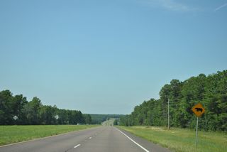 SR 85 turns northwest from SR 293 (Mid-Bay Bridge Connector) ahead of Juniper Creek in Eglin AFB.