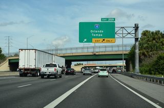 Exit 259 departs from the Turnpike north with two lanes at the Oak Ridge Road overpass.