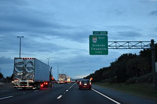 One mile ahead of the directional T interchange (Exit 265) with SR 408 (East West Expressway). SR 408 provides a commuter route from Ocoee, Winter Garden and Clermont east to Downtown Orlando and the University of Central Florida (UCF).