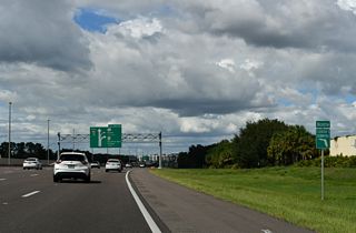 With auxiliary lanes in each direction, the toll road expands to 12 overall lanes between SR 408 / Exit 265 and SR 429 / Exit 267 A.