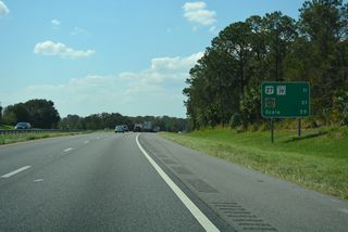 Posted 11 miles from U.S. 27/SR 19, this distance sign predated the opening of the Minneola interchange. The replacement removed the line for CR 270 and added Minneola at five miles.