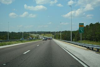 Florida's Turnpike curves around Camp Lake just beyond Exit 278. $233 million in construction widening the toll road to eight overall lanes between Minneola and O'Brien Road beyond Exit 285, runs through mid-2028.