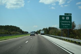U.S. 27 and SR 19 meet at a parclo B2 interchange tying into the Turnpike access road in an unincorporated area midway between Clermont and Leesburg.