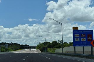 The Turnpike passes over Hempel Avenue one mile ahead of the Turkey Lake Service Plaza.