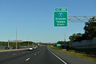 Florida's Turnpike advances two miles southeast between Bill Frederick Park at Turkey Lake and the Conroy Club subdivision to Exit 259 for Interstate 4.