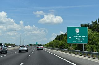 A series of signs direct visitors to the Orlando area to various points of interest. Florida's Turnpike south to SR 528 (Beachline Expressway) east is the most direct route to Orlando International Airport (MCO).