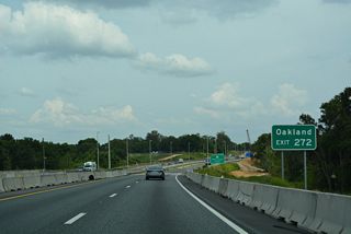 Exit 272 serves the town of Oakland and city of Winter Garden on the south side of Lake Apopka and suburban areas of both communities around Johns Lake south of the Turnpike. SR 50 provides one of two routes between Oakland and Winter Garden with Oakland Avenue (CR 438) being the other.