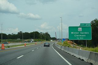 Oakland Avenue and the parallel West Orange Trail pass over the toll road within one half mile of Exit 272. The trail follows the path of a former railroad line throughout western Orange County.