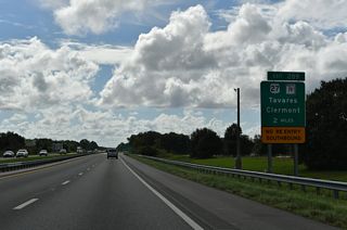 The ramps at Exit 289 were built in conjunction with the Leesburg main line Toll Plaza that replaced the previous Wildwood facility 14 miles to the northwest. Construction for the new exit got underway in January 1994.2,3