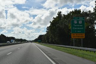 SR 19 meets U.S. 27 south of the Turnpike at Exit 285, four miles southeast. Prior to July 1995, all traffic for both routes used the ramps at Exit 285.4 Clermont, a suburban bedroom community for Orlando, lies southeast along U.S. 27 at SR 50.