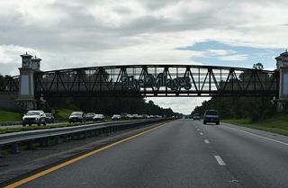 The Water Lily Bridge multiuse trail bridge spans between areas of The Villages master-planned community.
