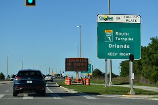 Hancock Road enters the exchange with Florida's Turnpike in Minneola north of the signalized intersection with Citrus Grove Boulevard.