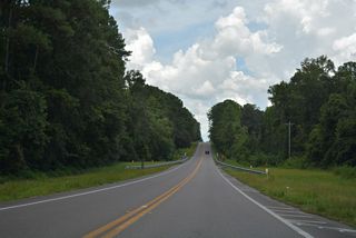 Bull Creek flows between rural residential neighborhoods in southwest Middleburg.