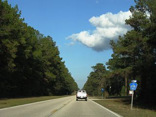 The reassurance marker for CR 215 north posted ahead of Oak Grove Baptist Church was removed by 2011.