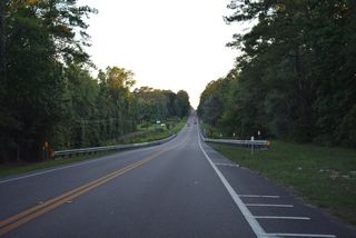Heading southwest from SR 21 and Primrose Avenue, CR 215 lowers to cross Bull Creek.