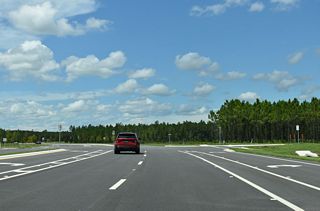 Designed to accommodate future development, four intersections with stubs line Cathedral Oak Parkway between SR 23 and CR 218.
