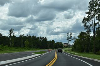 Cathedral Oak Parkway branches southwest from CR 315 at Maryland Avenue. The alignment of CR 315 proceeds west to Fuzzy Lane then south across CR 214.