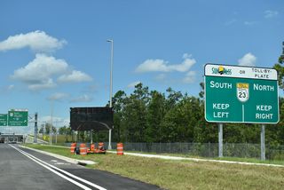 The diverging diamond interchange at Exit 23 joins SR 23 (First Coast Expressway) with Cathedral Oak Parkway.