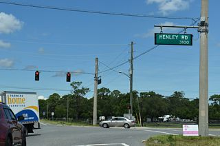 Traffic signals were added at the intersection joining CR 218 with CR 739 (Henley Road) north after 2011.