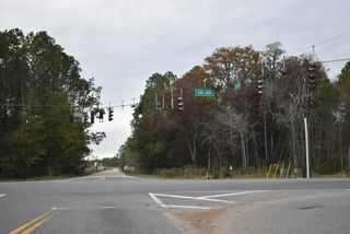 County Road 218 concludes at U.S. 301 and the north end of the FDOT Concrete Test Road between Highland and Maxville.