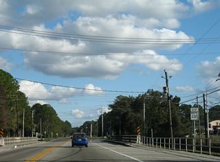 The bridge taking SR 230 (Call Street) across Alligator Creek before the addition of metal guard rails.