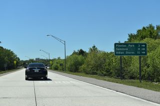 SR 694 (Gandy Boulevard / Park Boulevard) runs west across the city of Pinellas Park to 78 Street N. The city of Seminole lies west of Cross Bayou Canal. The town of Indian Shores stretches along the barrier island beyond The Narrows / Intracoastal Waterway.
