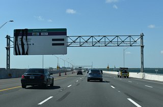 South from the Howard Frankland Bridge, Interstate 275 is formally St. Petersburg Parkway and William C. Kramer Highway. These designations overlay all of the freeway on peninsular Pinellas County.
