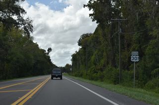 U.S. 301 continues southwest adjacent to areas of both Lower Hillsborough Wilderness Preserve and Hillsborough River State Park.
